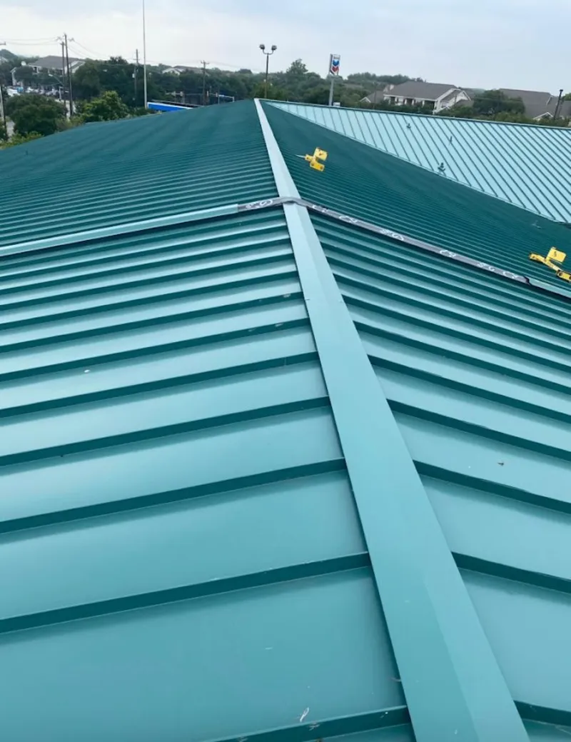 Green commercial metal roof ridge and valley for Metal Roof Repair in La Joya